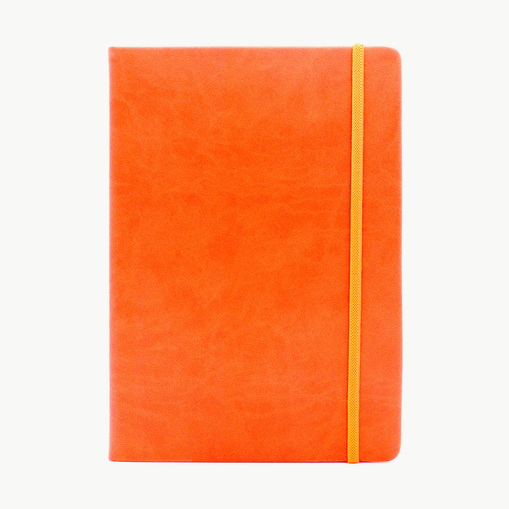 Orange notebook with a yellow elastic band on a white background